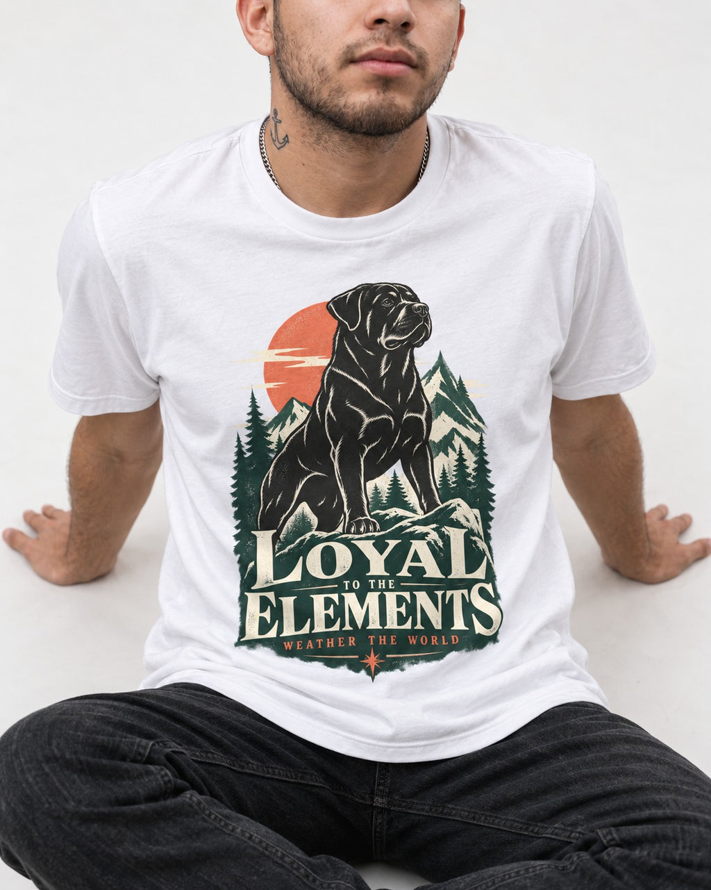 Rottweiler Loyal to the Elements T-Shirt in White, worn by a seated model