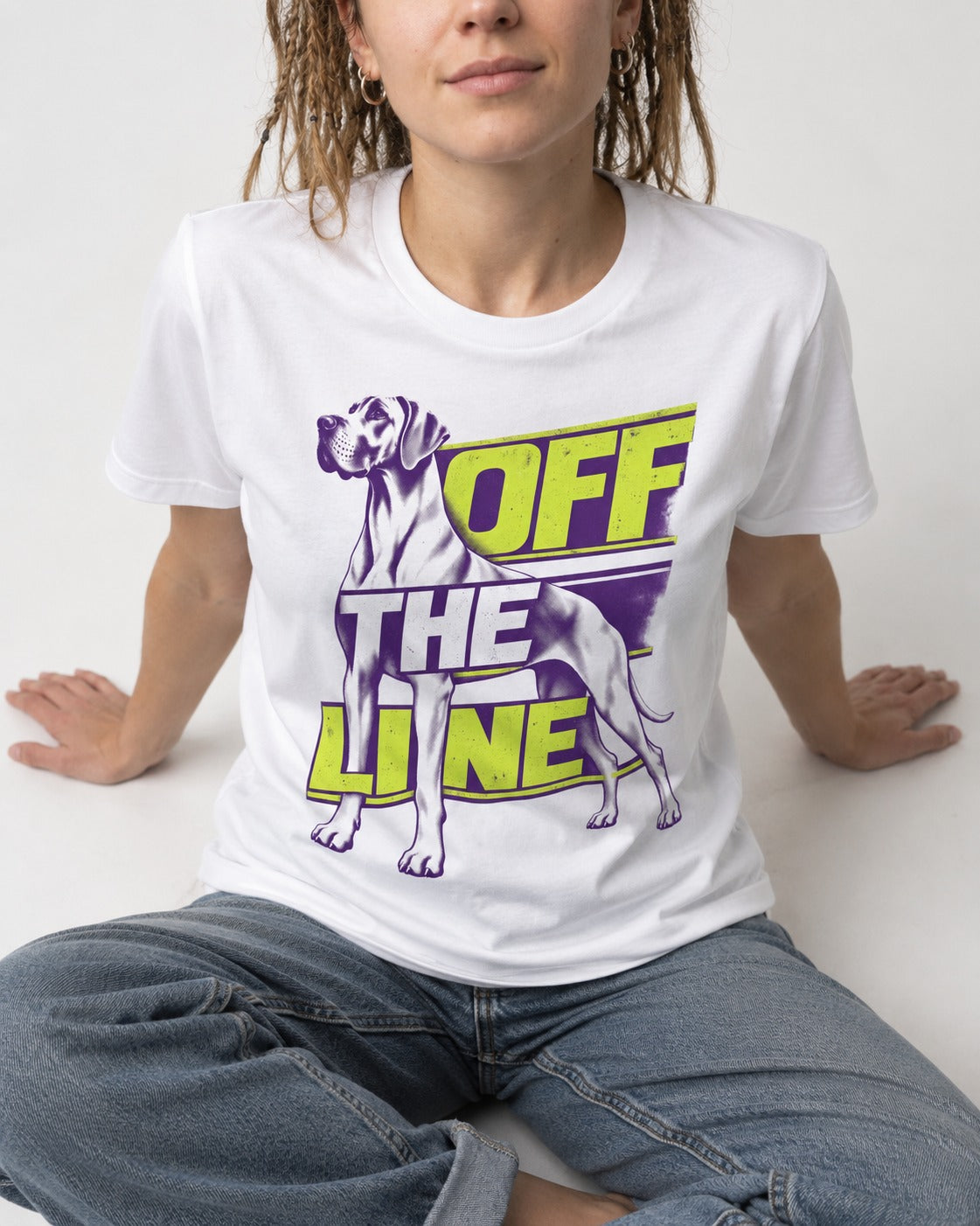 Great Dane Off the Line T-Shirt in White, worn by a seated model