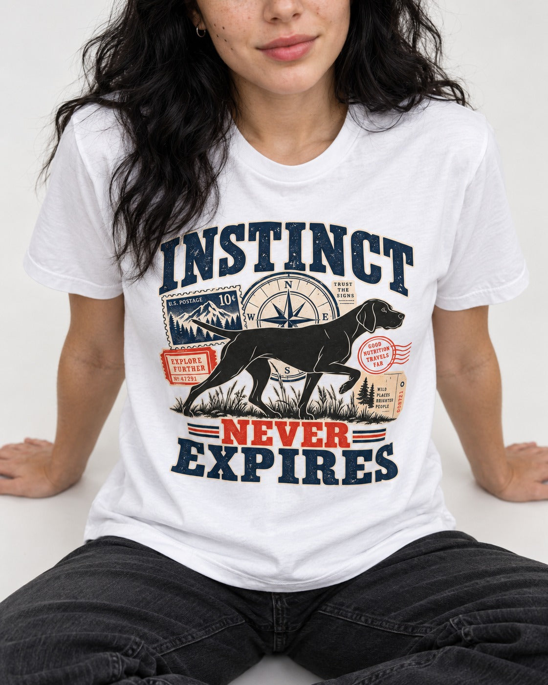 German Shorthaired Pointer Instinct Never Expires T-Shirt in White, worn by a seated model