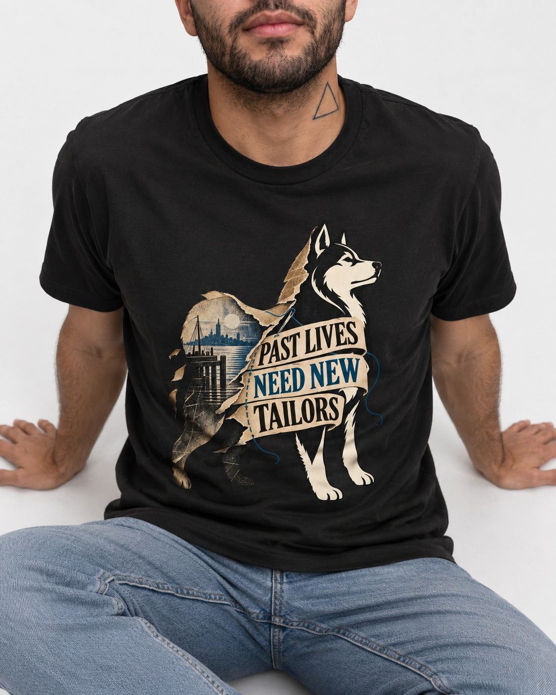 Husky Past Lives Need New Tailors Split Identity Graphic T-Shirt in Black, worn by a seated model