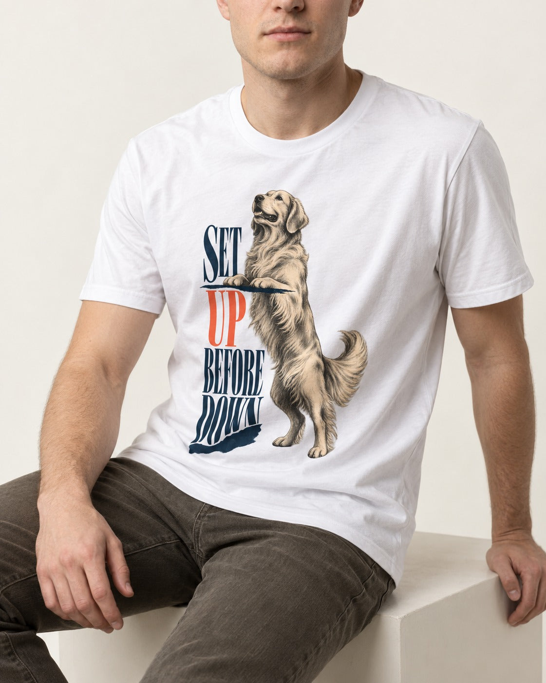Golden Retriever Set Up Before Down T-Shirt in White, worn by a seated model