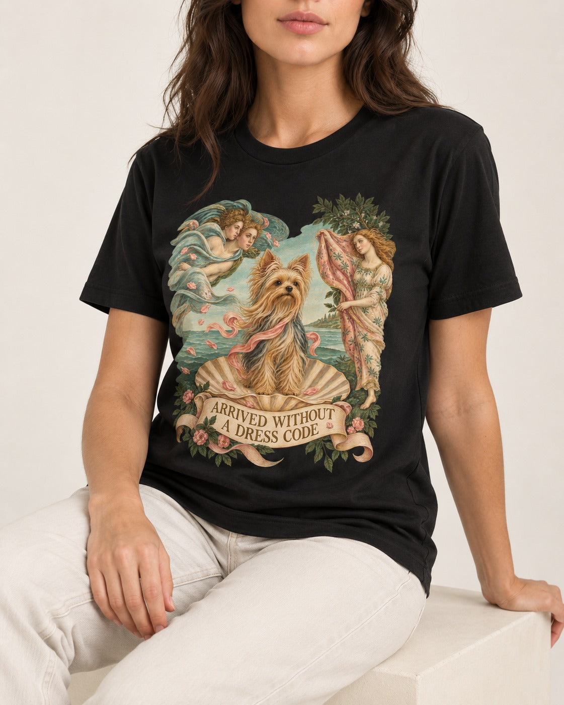 Yorkshire Terrier Arrived Without a Dress Code Venus Graphic T-Shirt in Black, worn by a seated model