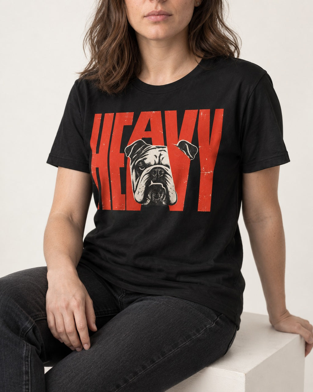 English Bulldog Heavy Stacked Portrait Graphic T-Shirt in Black, worn by a seated model