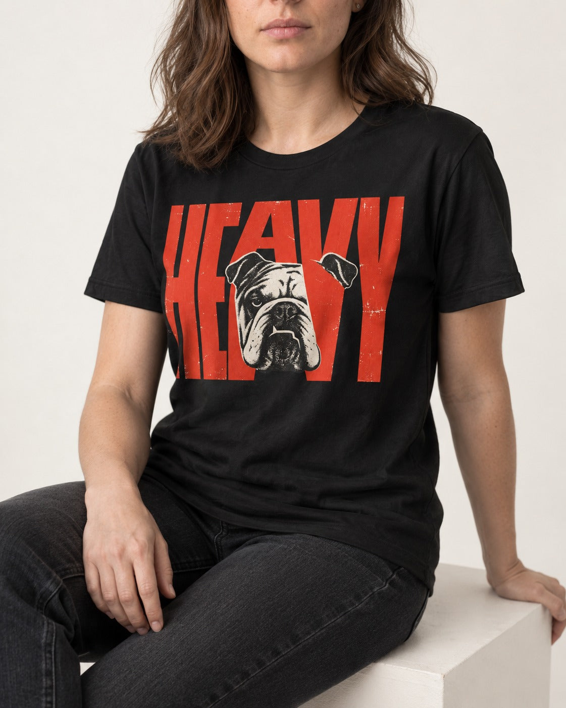English Bulldog Heavy Stacked Portrait Graphic T-Shirt in Black, worn by a seated model