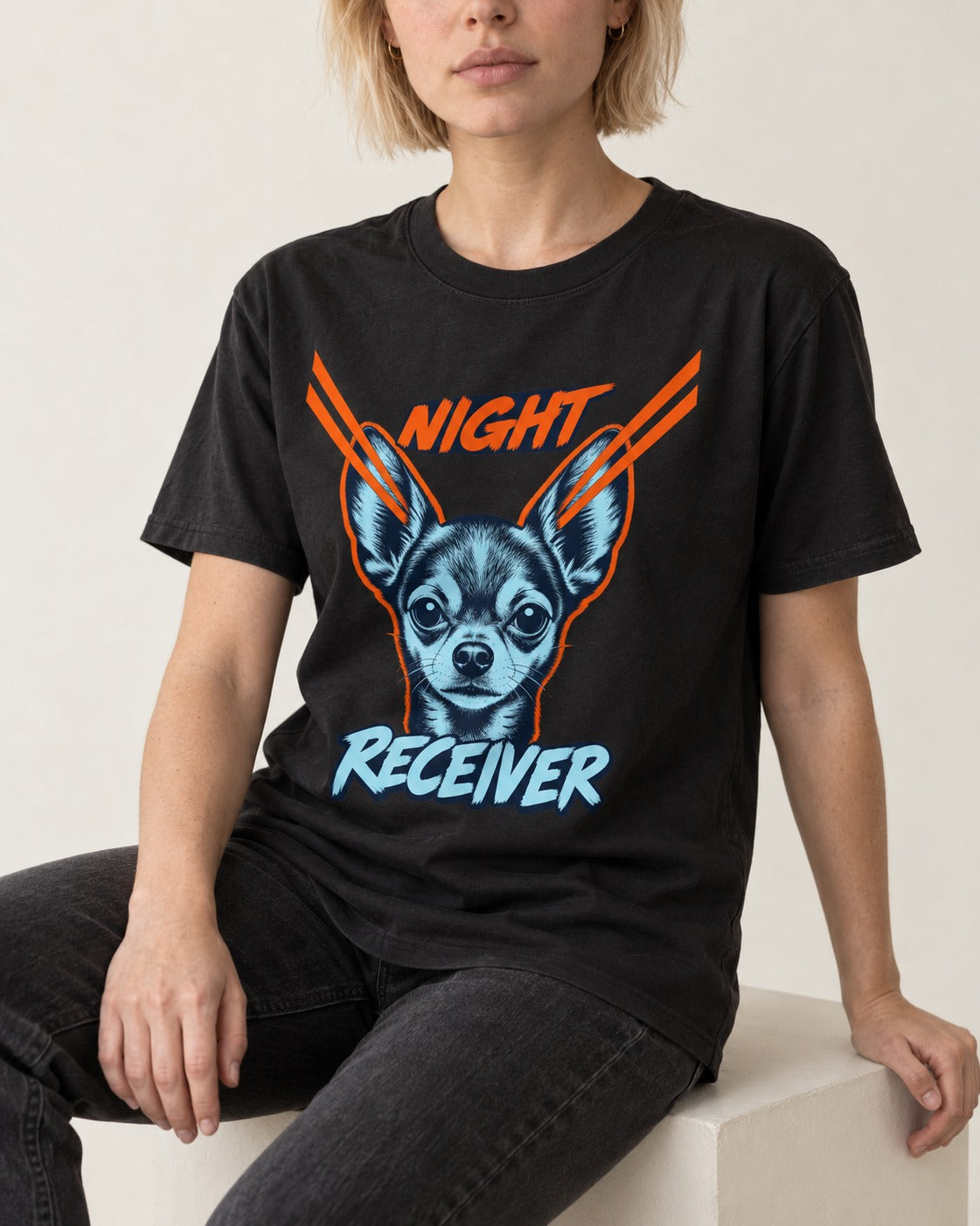 Chihuahua Night Receiver Signal Portrait Graphic T-Shirt in Black, worn by a seated model