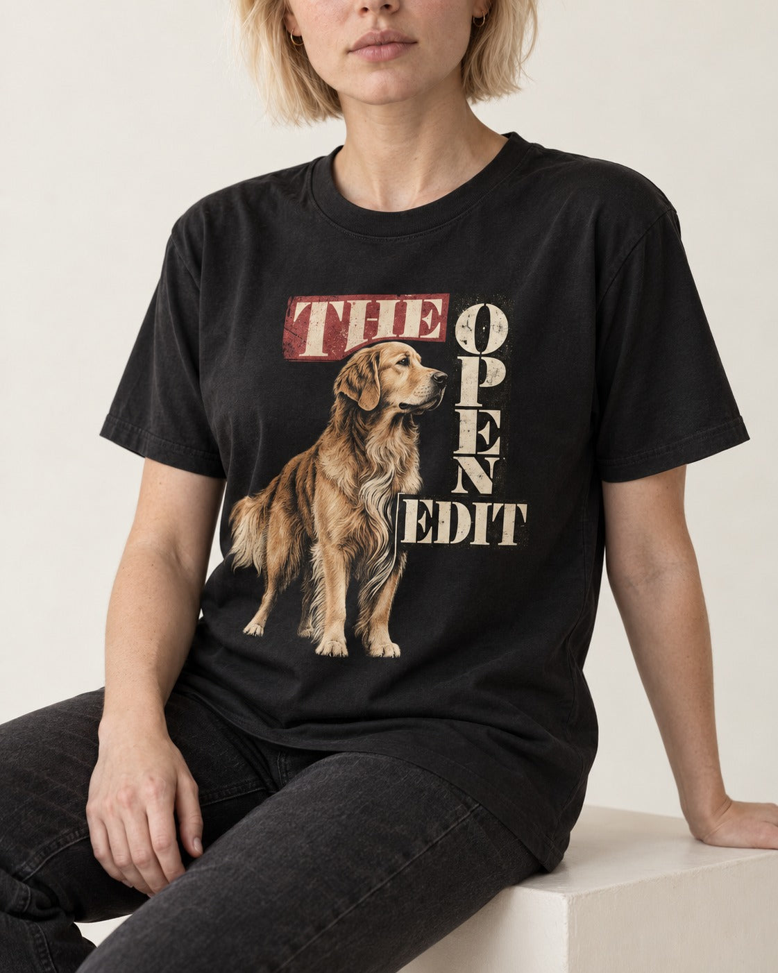 Golden Retriever The Open Edit Typography Portrait Graphic T-Shirt in Black, worn by a seated model