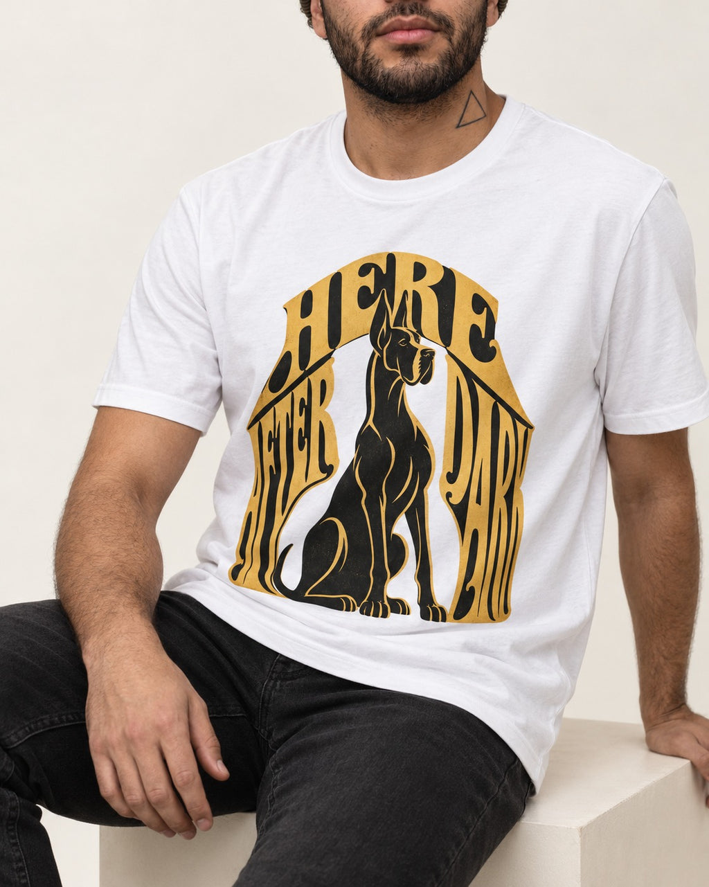 Great Dane Here After Dark T-Shirt in White, worn by a seated model