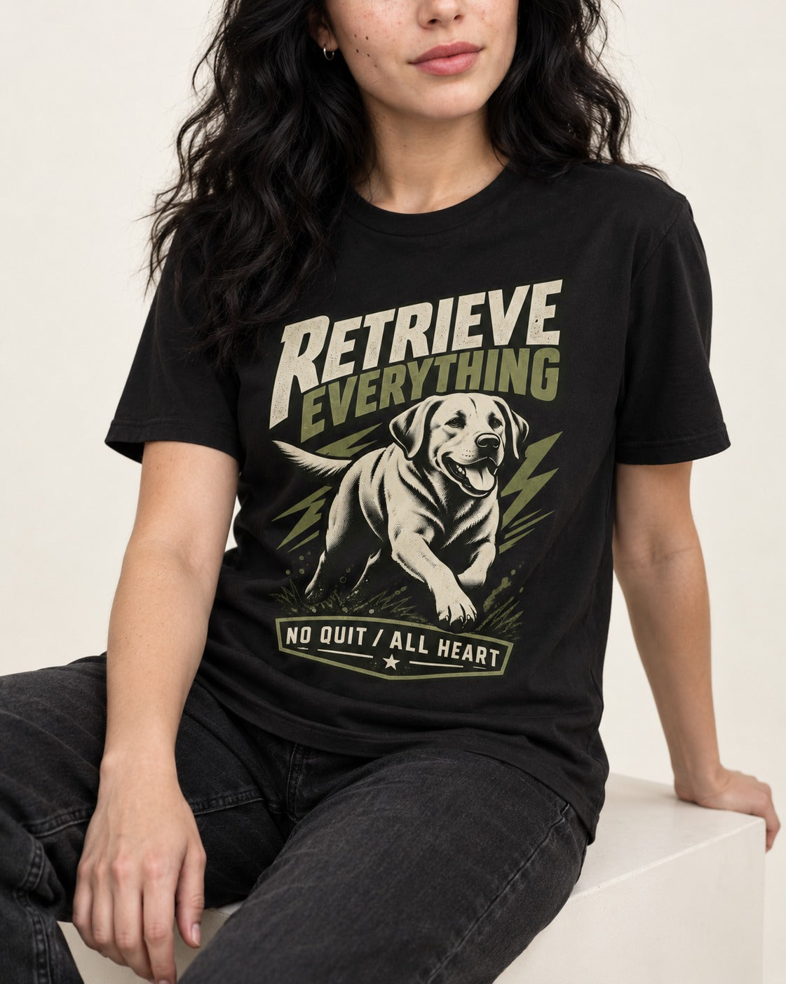 Labrador Retriever Retrieve Everything No Quit All Heart Running Graphic T-Shirt in Black, worn by a seated model