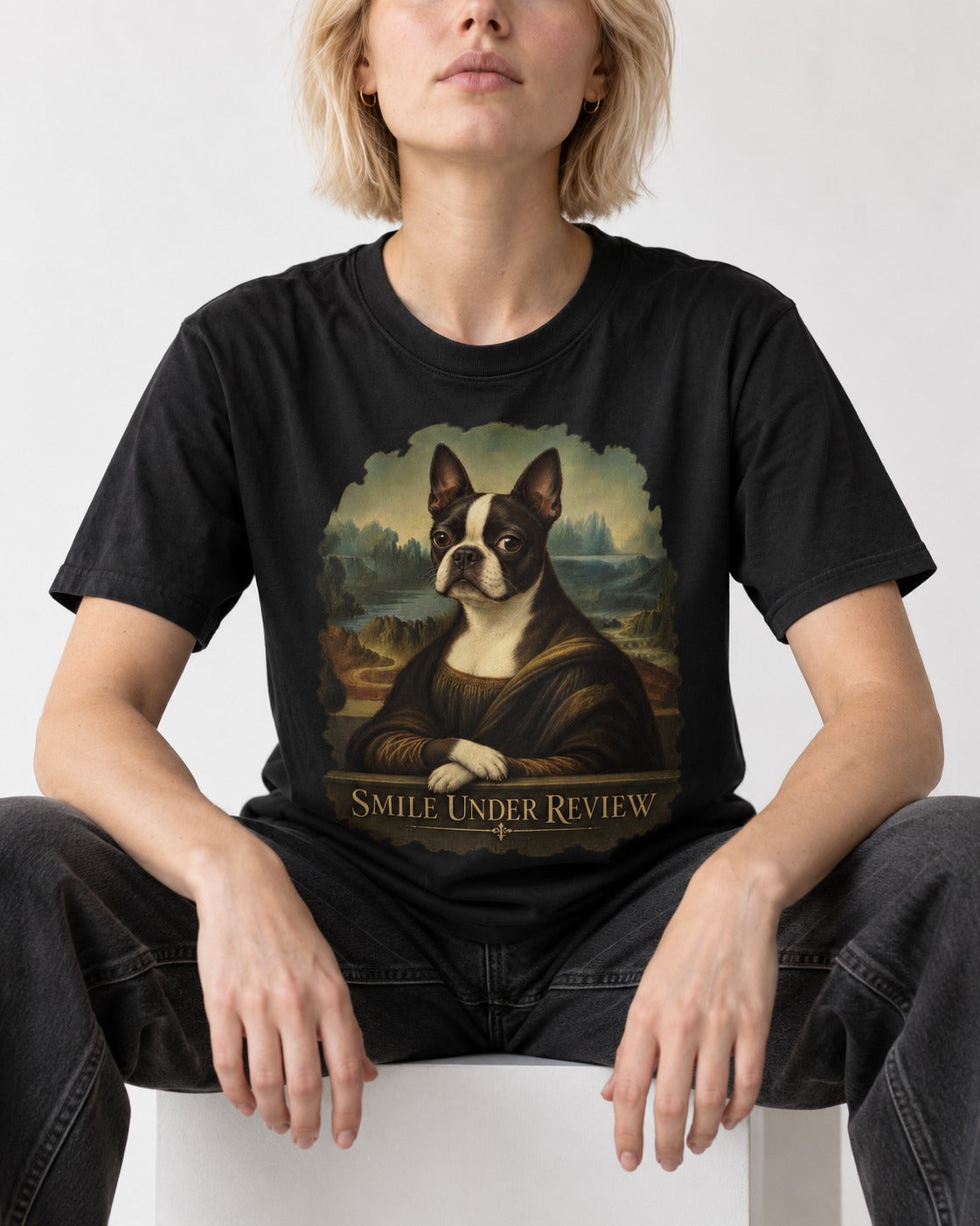 Smile Under Review Boston Terrier Mona Lisa Portrait T-Shirt in Black, worn by a seated model