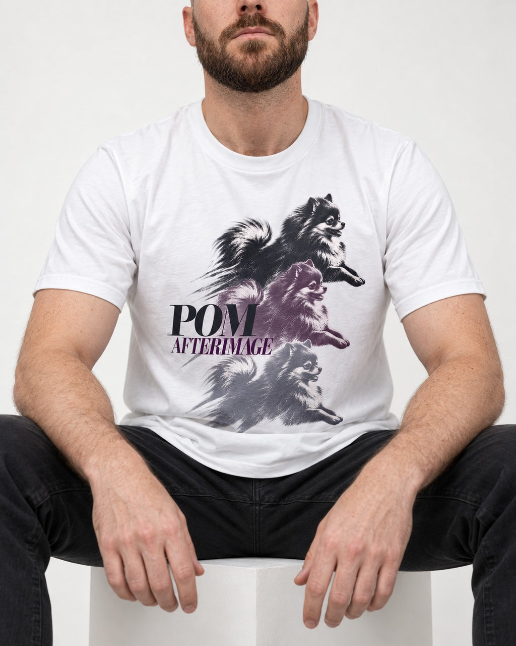Pomeranian Afterimage T-Shirt in White, worn by a seated model