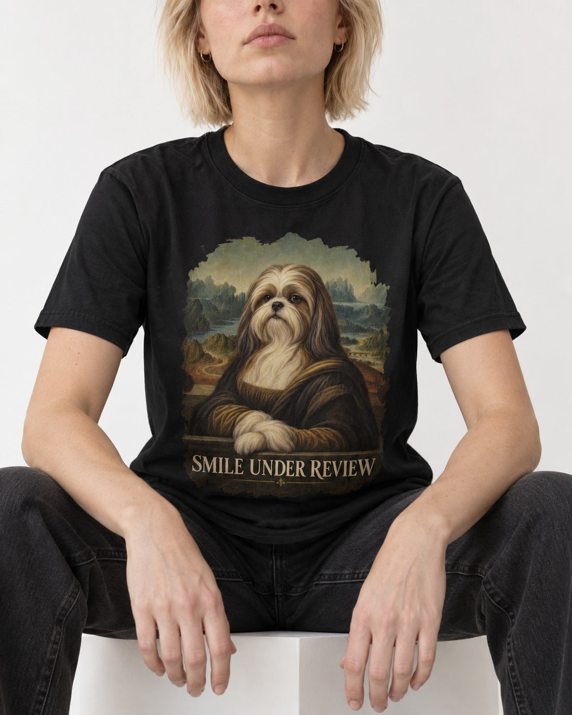 Shih Tzu Smile Under Review Old Master Portrait Graphic T-Shirt in Black, worn by a seated model