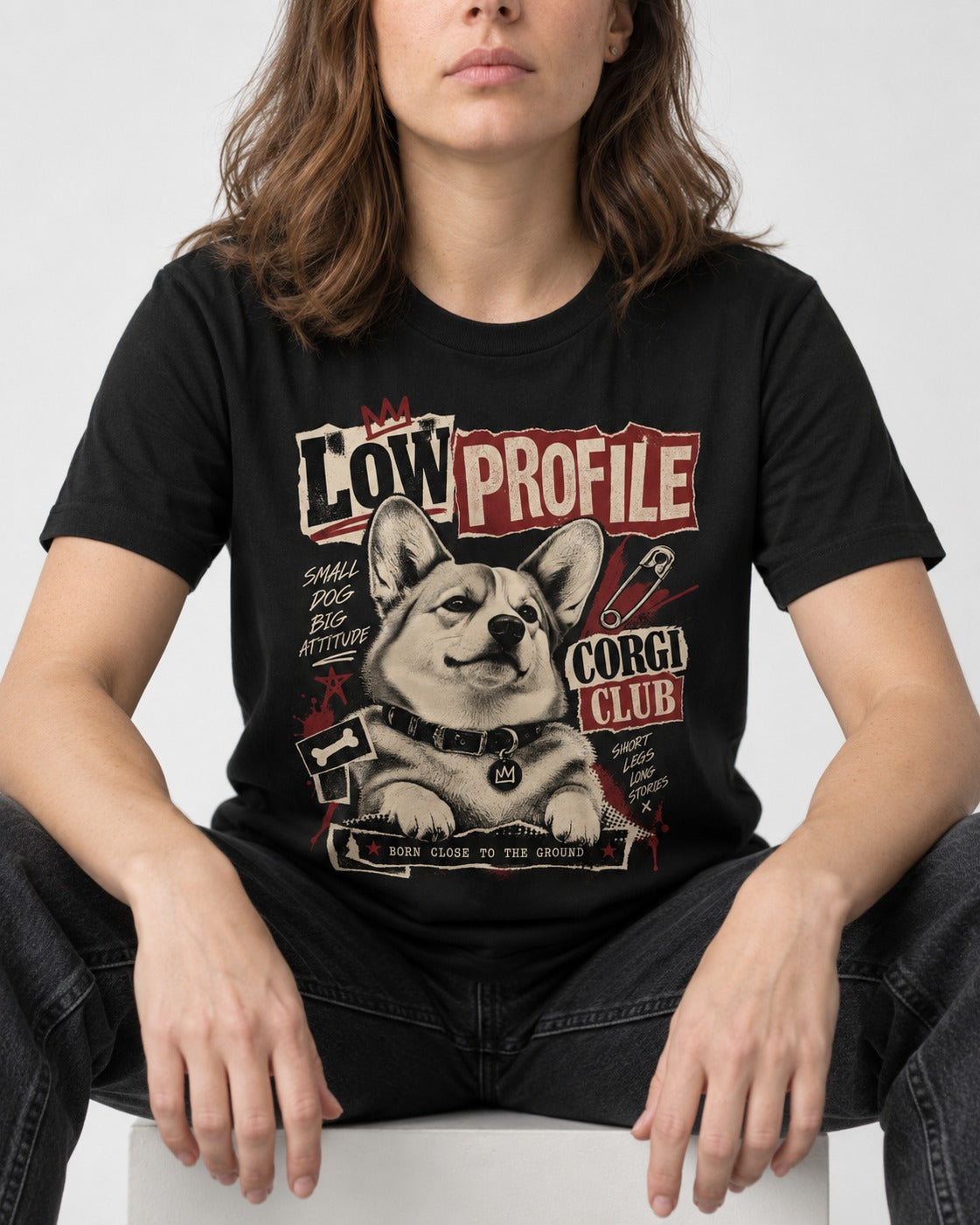 Corgi Low Profile Corgi Club Punk Collage Graphic T-Shirt in Black, worn by a seated model