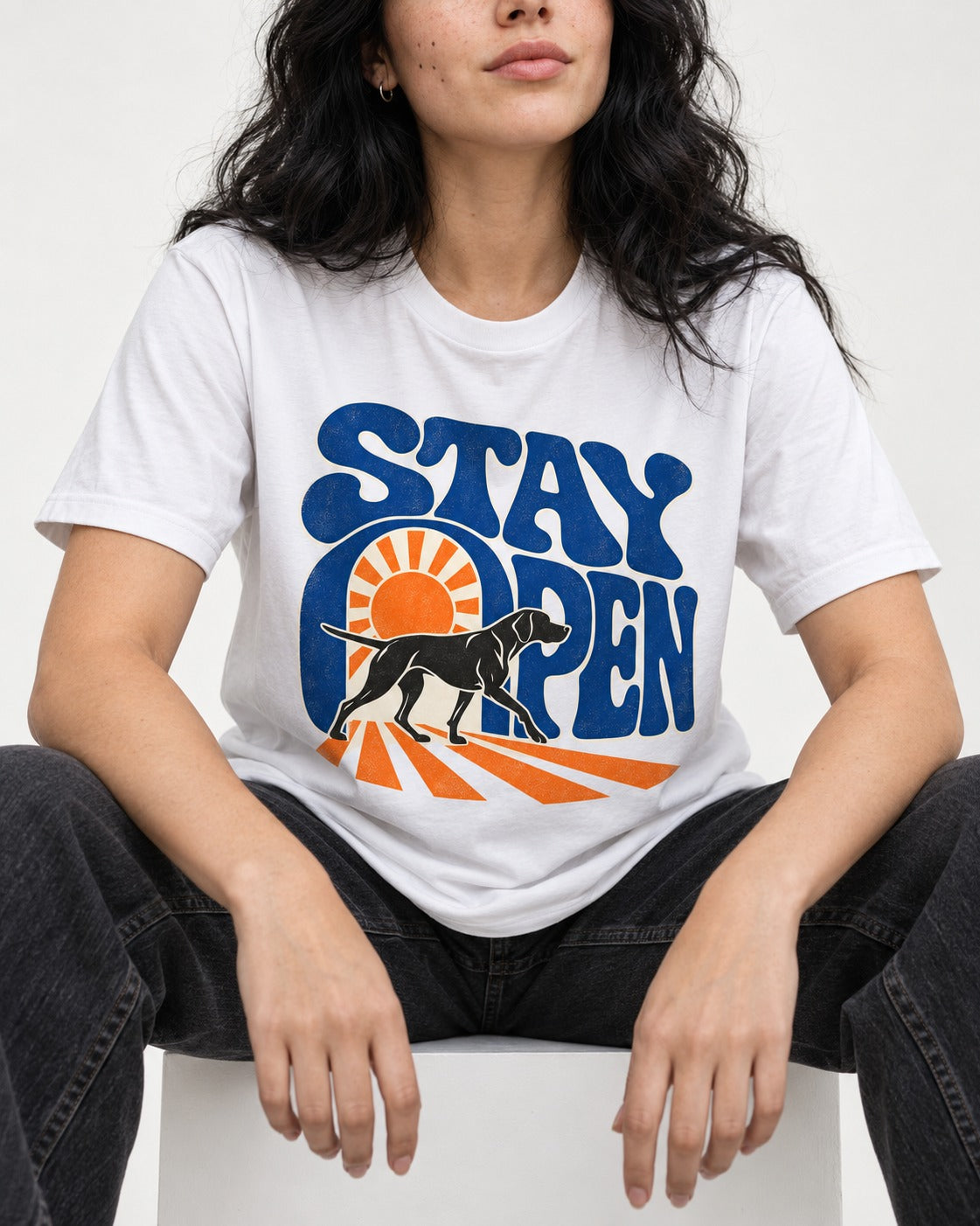 Stay Open German Shorthaired Pointer T-Shirt in White, worn by a seated model
