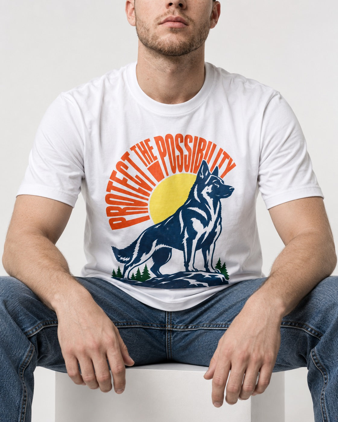 German Shepherd Dog Protect the Possibility T-Shirt in White, worn by a seated model