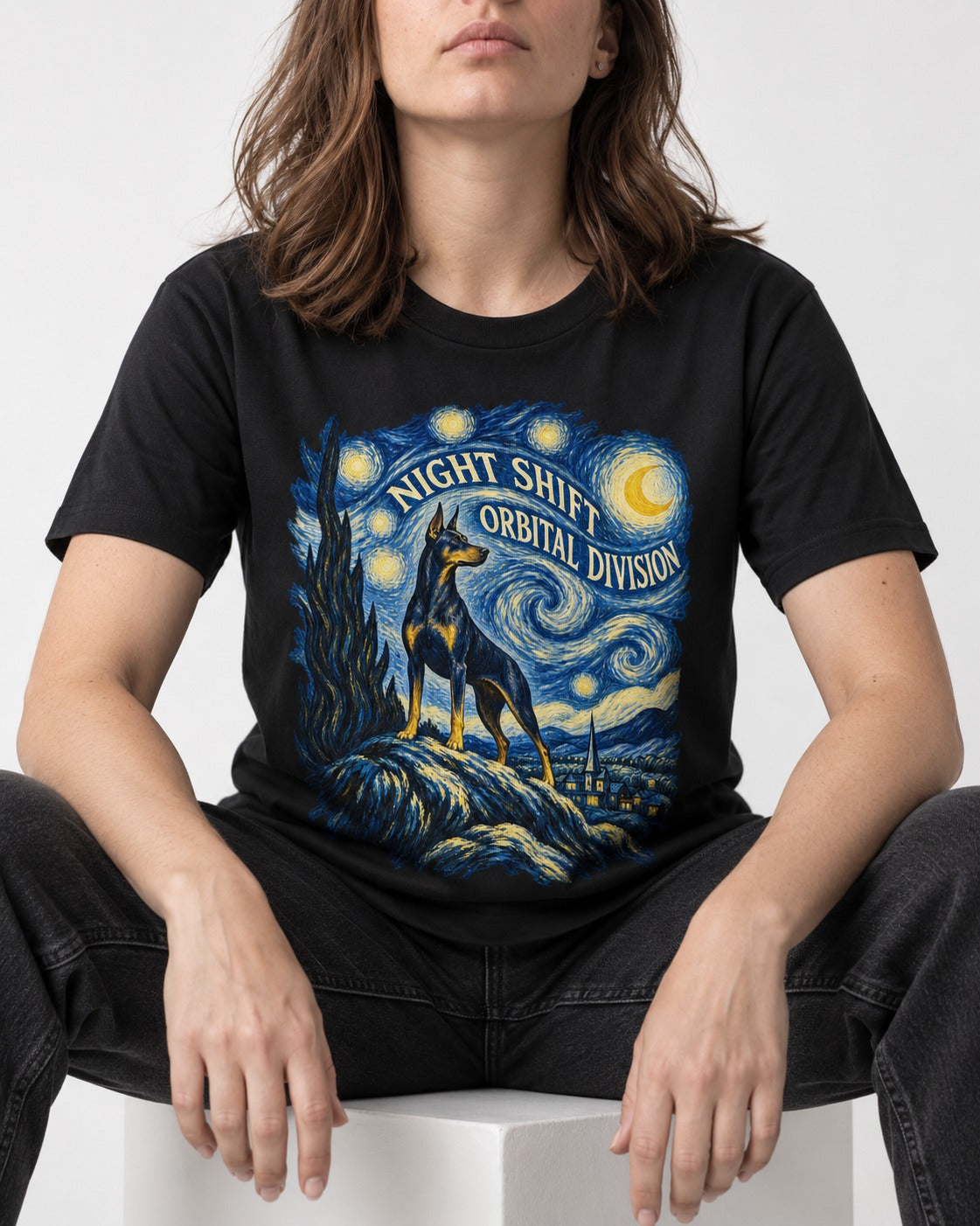 Doberman Night Shift Orbital Division Starry Night Graphic T-Shirt in Black, worn by a seated model
