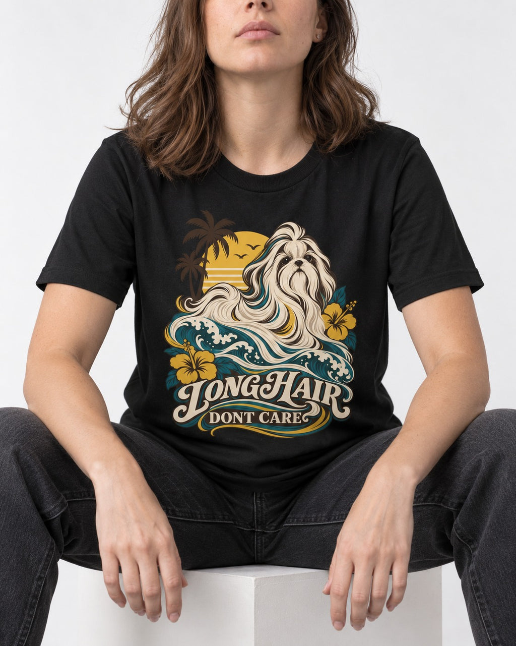 Shih Tzu Long Hair Don't Care Tropical Wave Graphic T-Shirt in Black, worn by a seated model