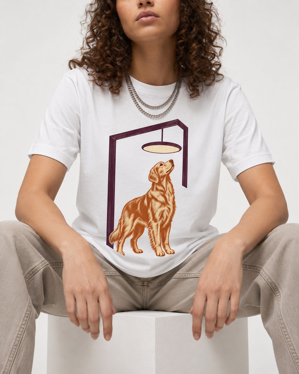 Golden Retriever Bright Idea T-Shirt in White, worn by a seated model