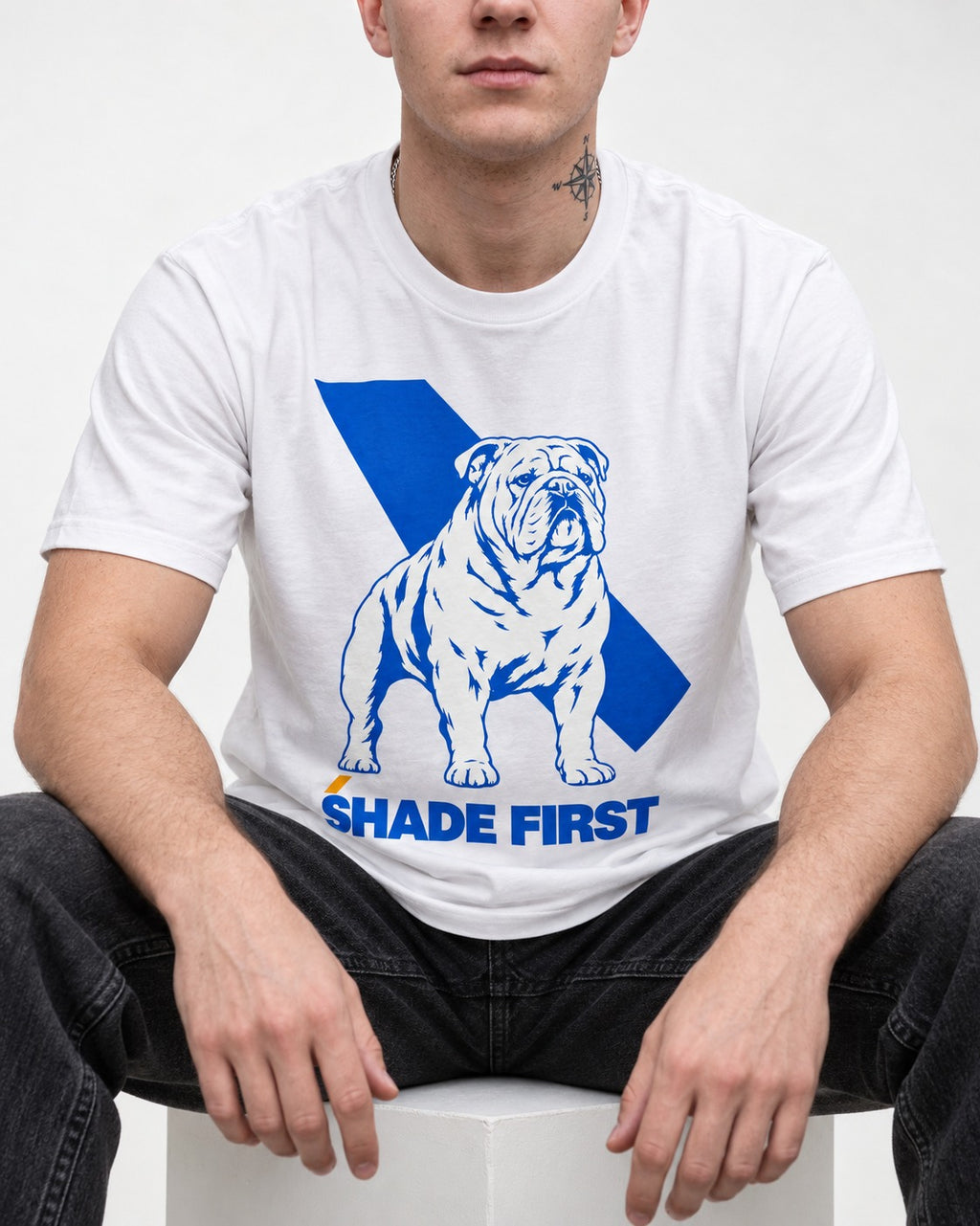 Shade First English Bulldog T-Shirt in White, worn by a seated model
