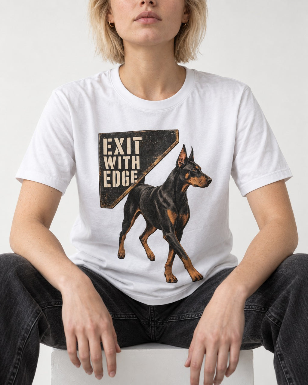 Exit with Doberman Edge T-Shirt in White, worn by a seated model