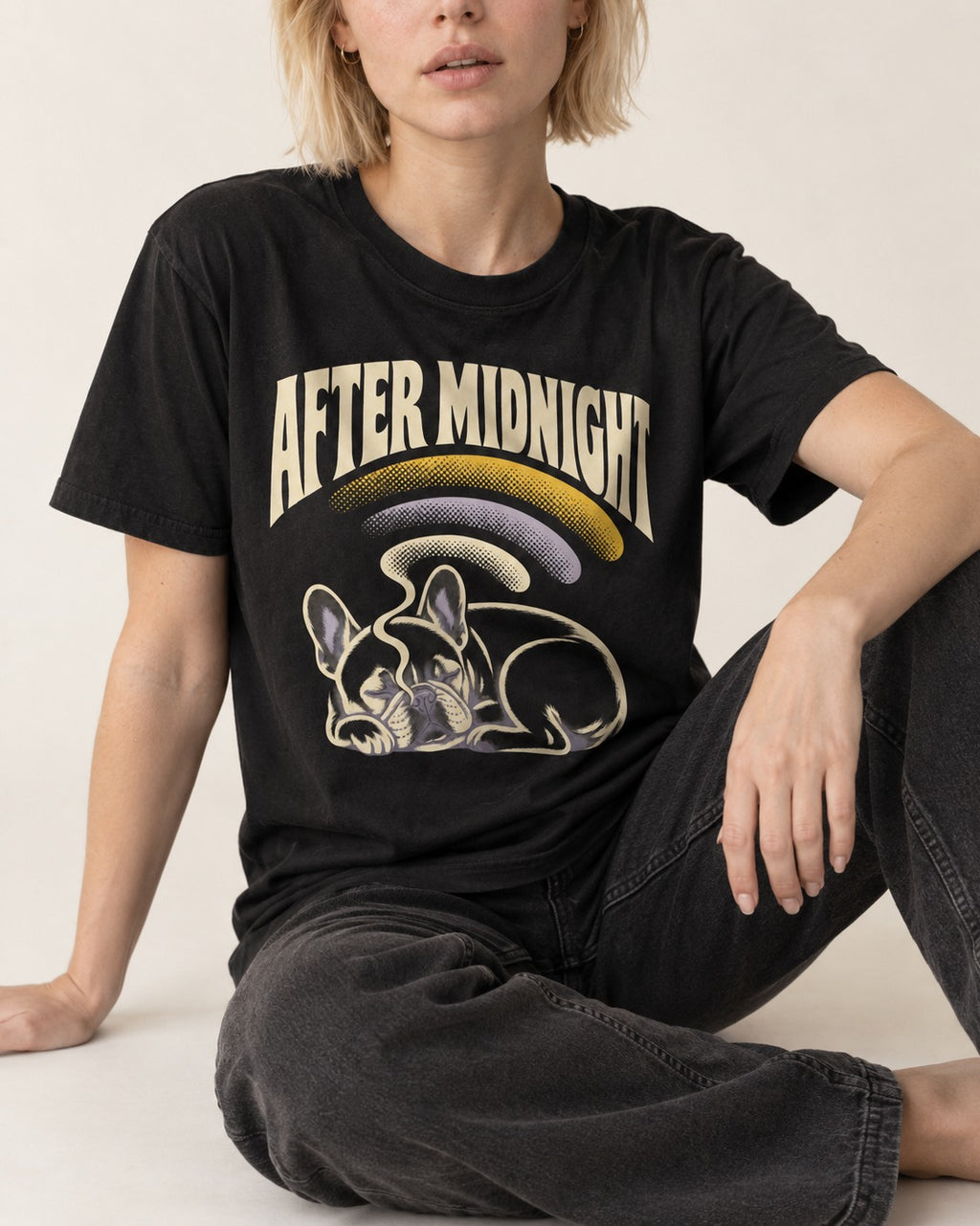 Frenchie After Midnight Sleeping Graphic T-Shirt in Black, worn by a seated model