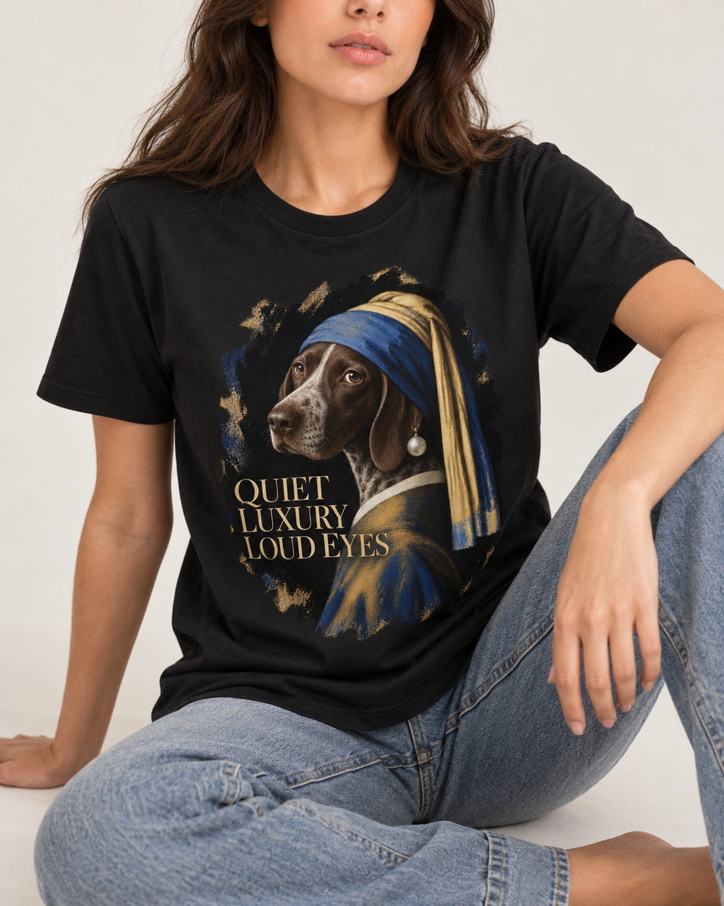 German Shorthaired Pointer Quiet Luxury Loud Eyes Pearl Earring Portrait Graphic T-Shirt in Black, worn by a seated model