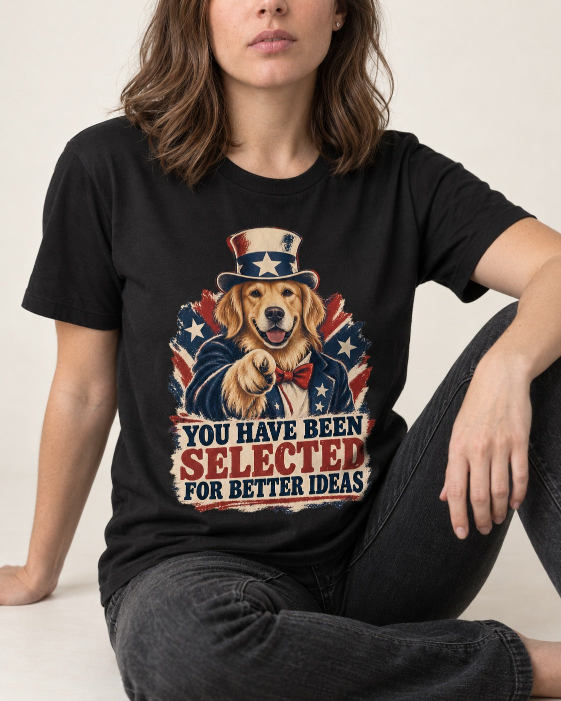 You Have Been Selected for Better Ideas Uncle Sam Golden Retriever Graphic T-Shirt in Black, worn by a seated model