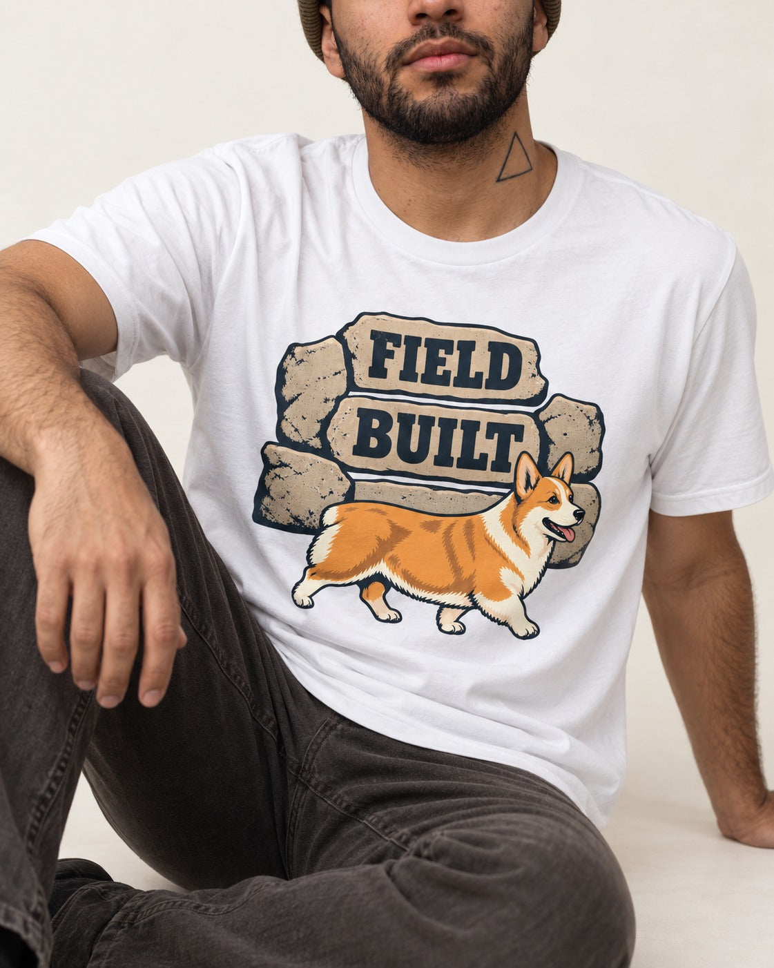 Field Built Corgi T-Shirt in White, worn by a seated model