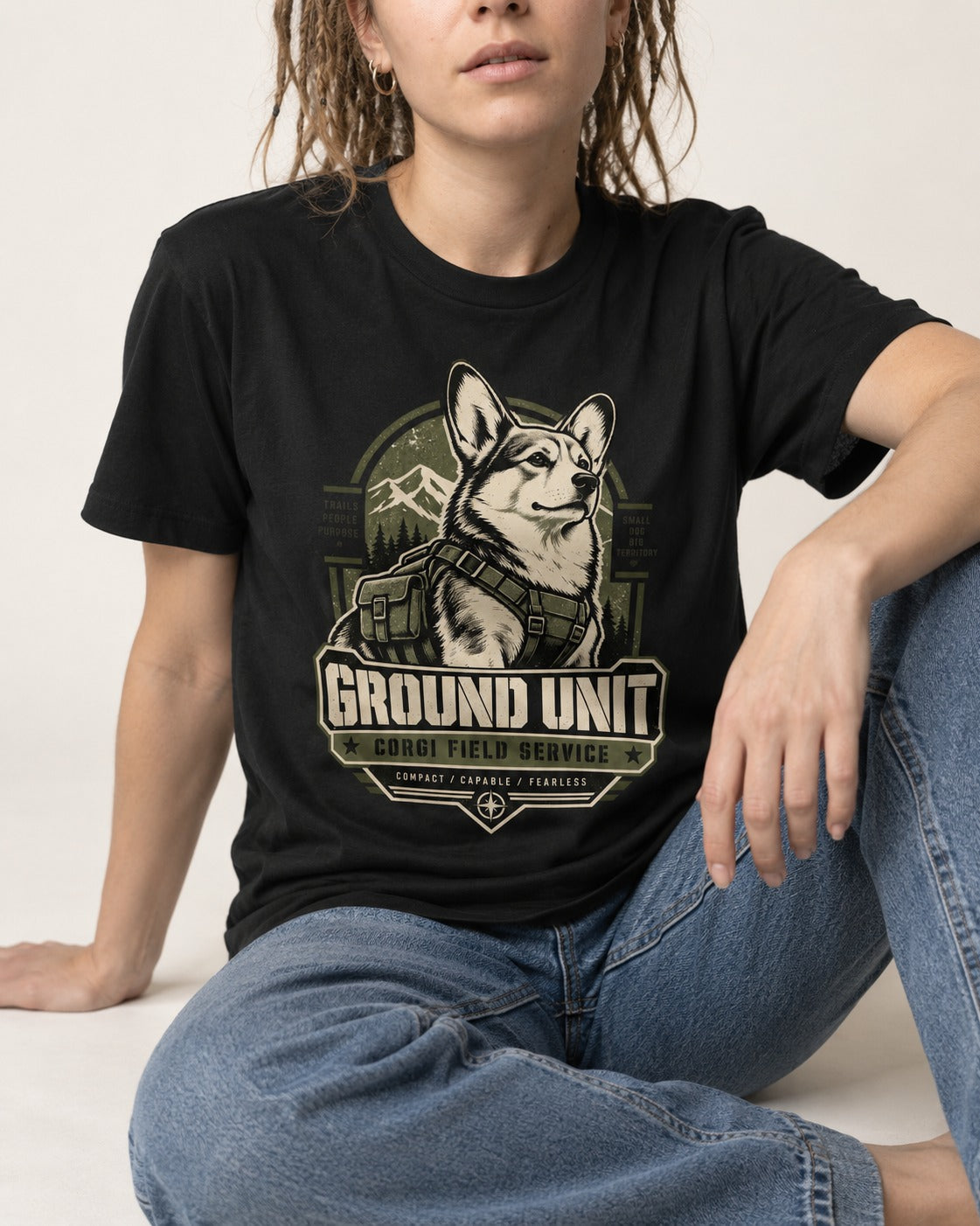 Corgi Ground Unit Field Service Badge T-Shirt in Black, worn by a seated model