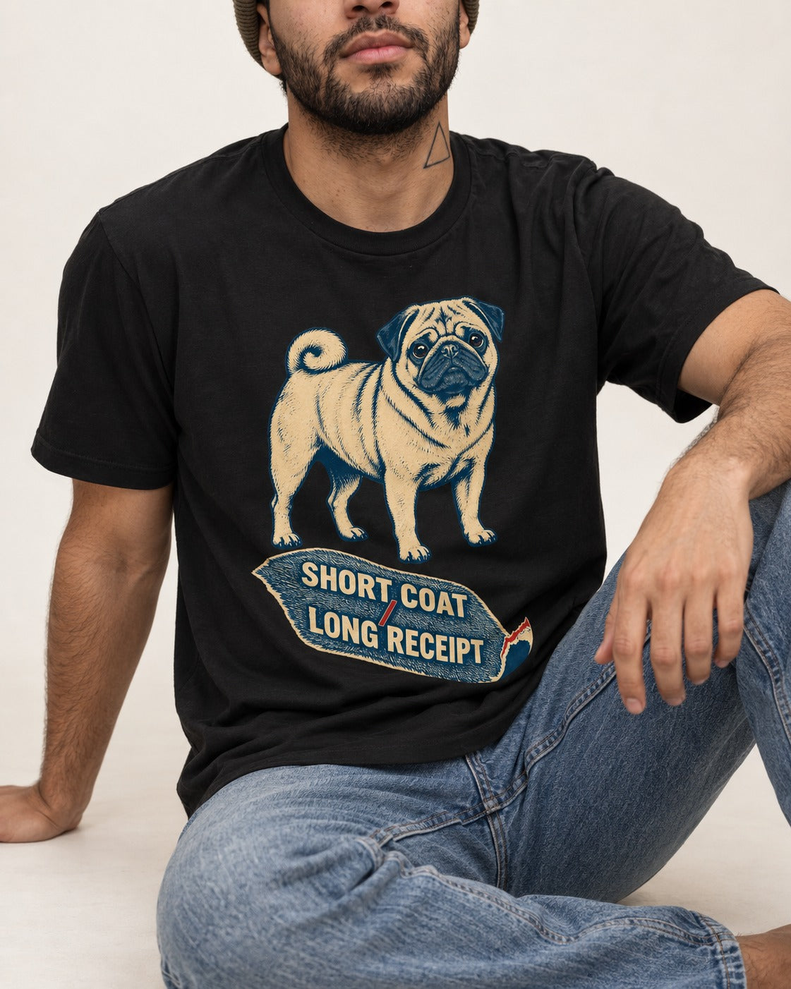 Pug Short Coat Long Receipt Graphic T-Shirt in Black, worn by a seated model