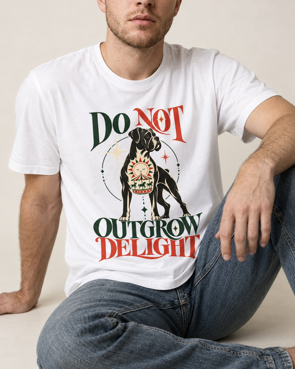 Boxer Do Not Outgrow Delight T-Shirt in White, worn by a seated model