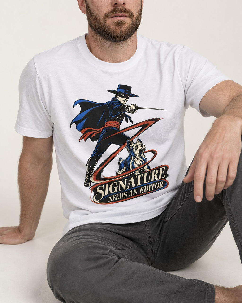 Yorkshire Terrier Signature Needs an Editor T-Shirt in White, worn by a seated model