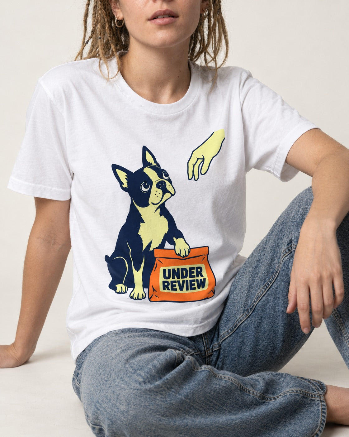 Boston Terrier Under Review T-Shirt in White, worn by a seated model