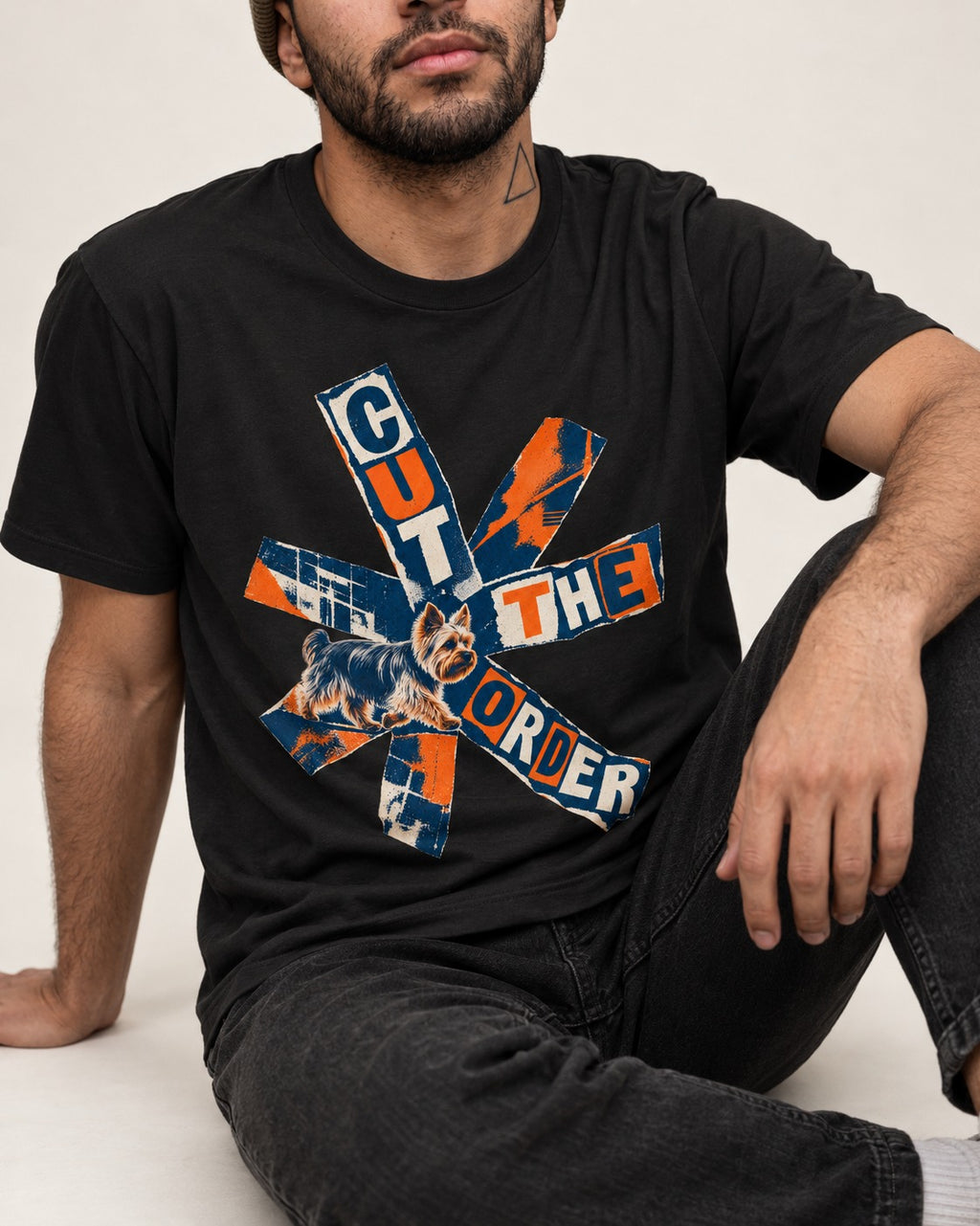 Yorkshire Terrier Cut the Order Radial Collage Graphic T-Shirt in Black, worn by a seated model