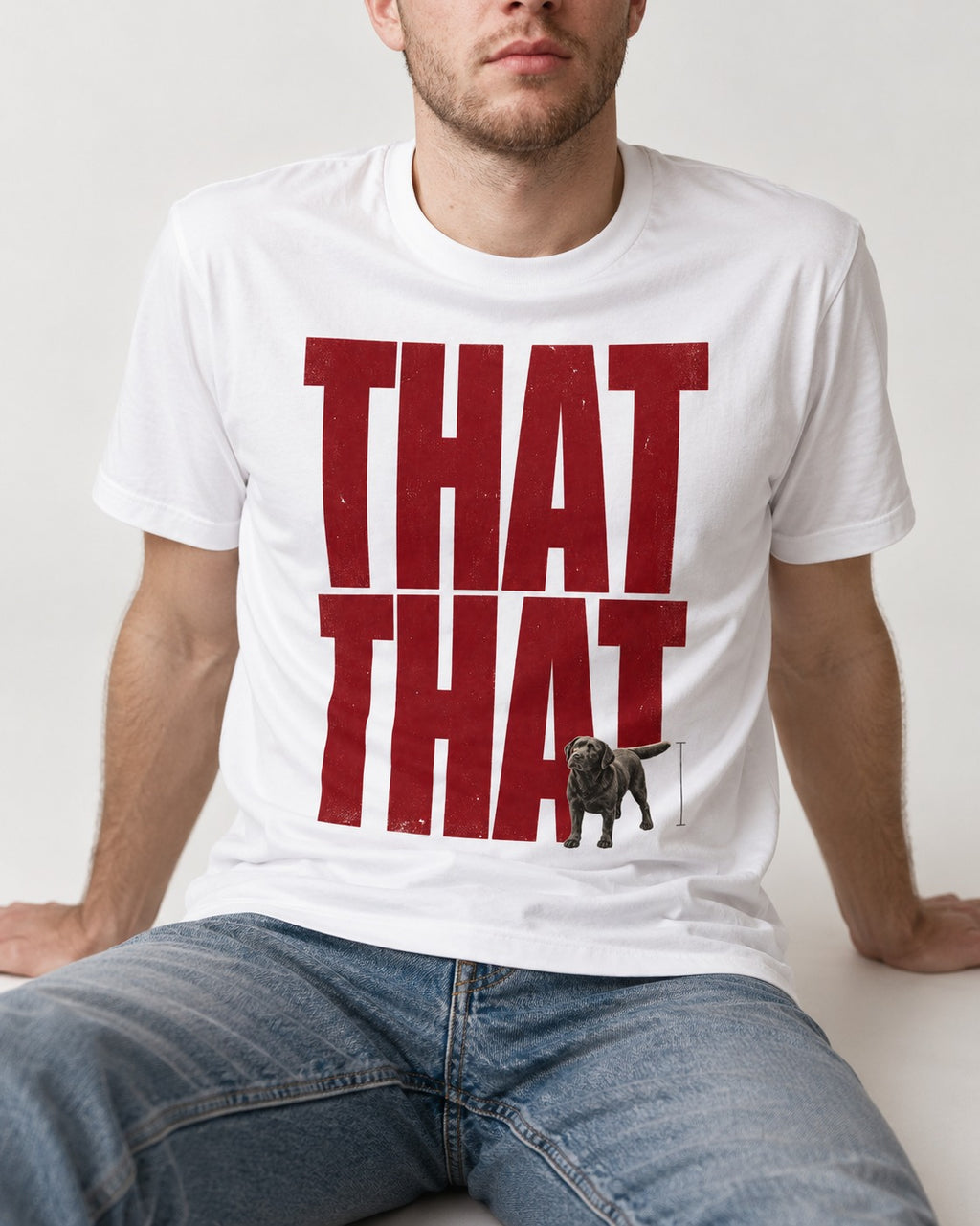 That That Labrador Retriever T-Shirt in White, worn by a seated model