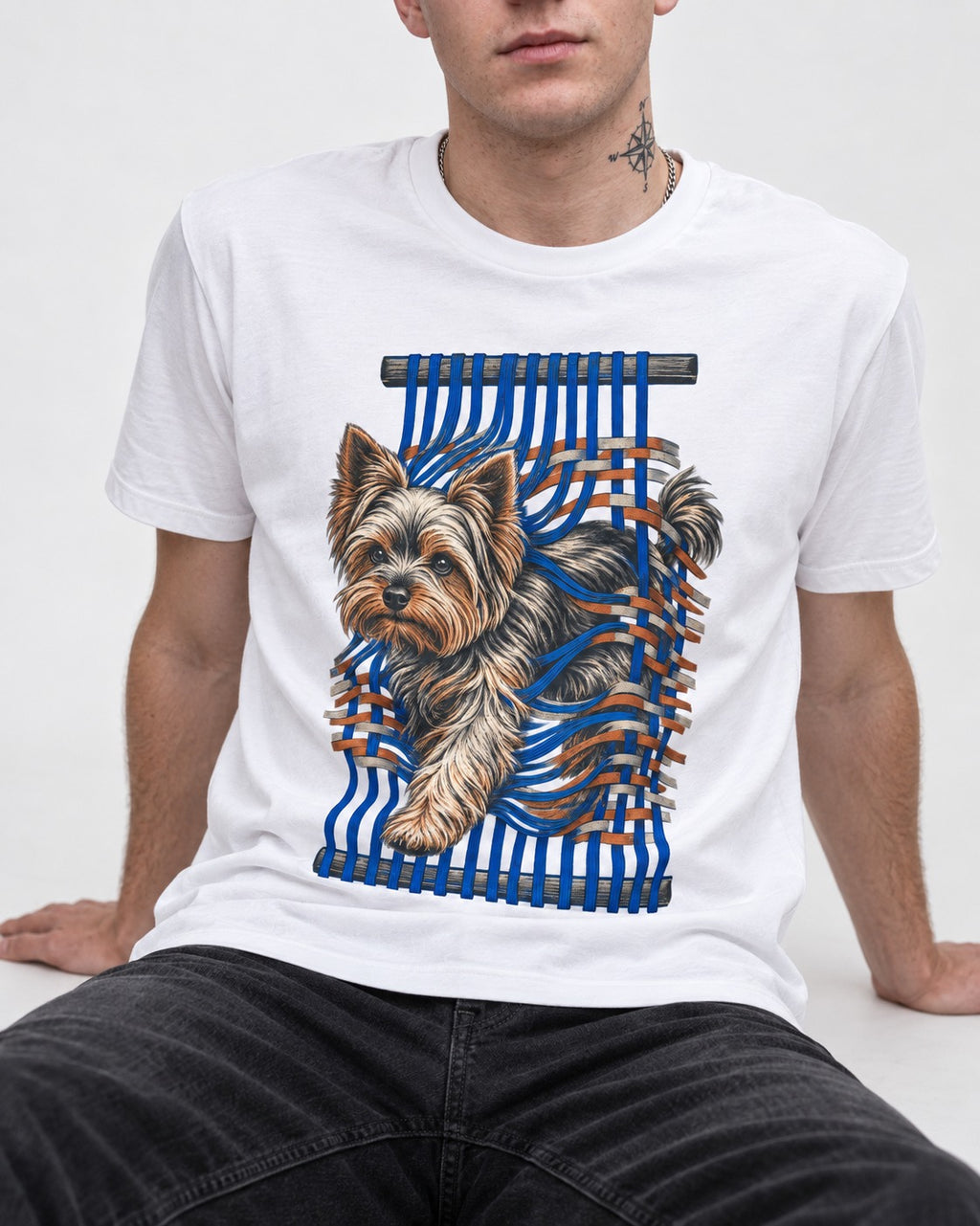Yorkshire Terrier Unbound T-Shirt in White, worn by a seated model