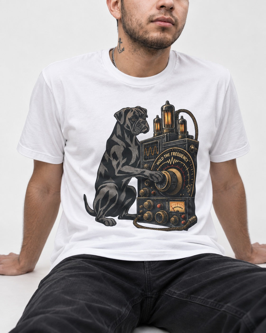 Hold the Boxer Frequency T-Shirt in White, worn by a seated model