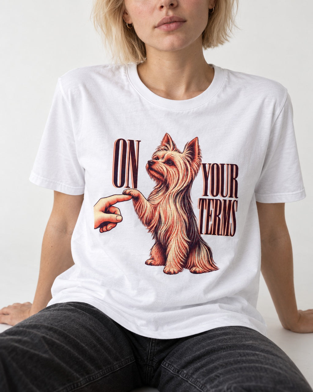Yorkshire Terrier On Your Terms T-Shirt in White, worn by a seated model