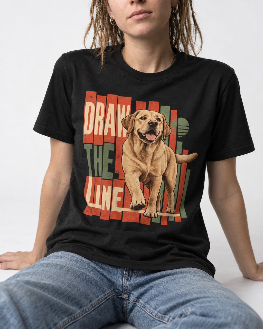 Labrador Retriever Draw the Line Stepping Graphic T-Shirt in Black, worn by a seated model