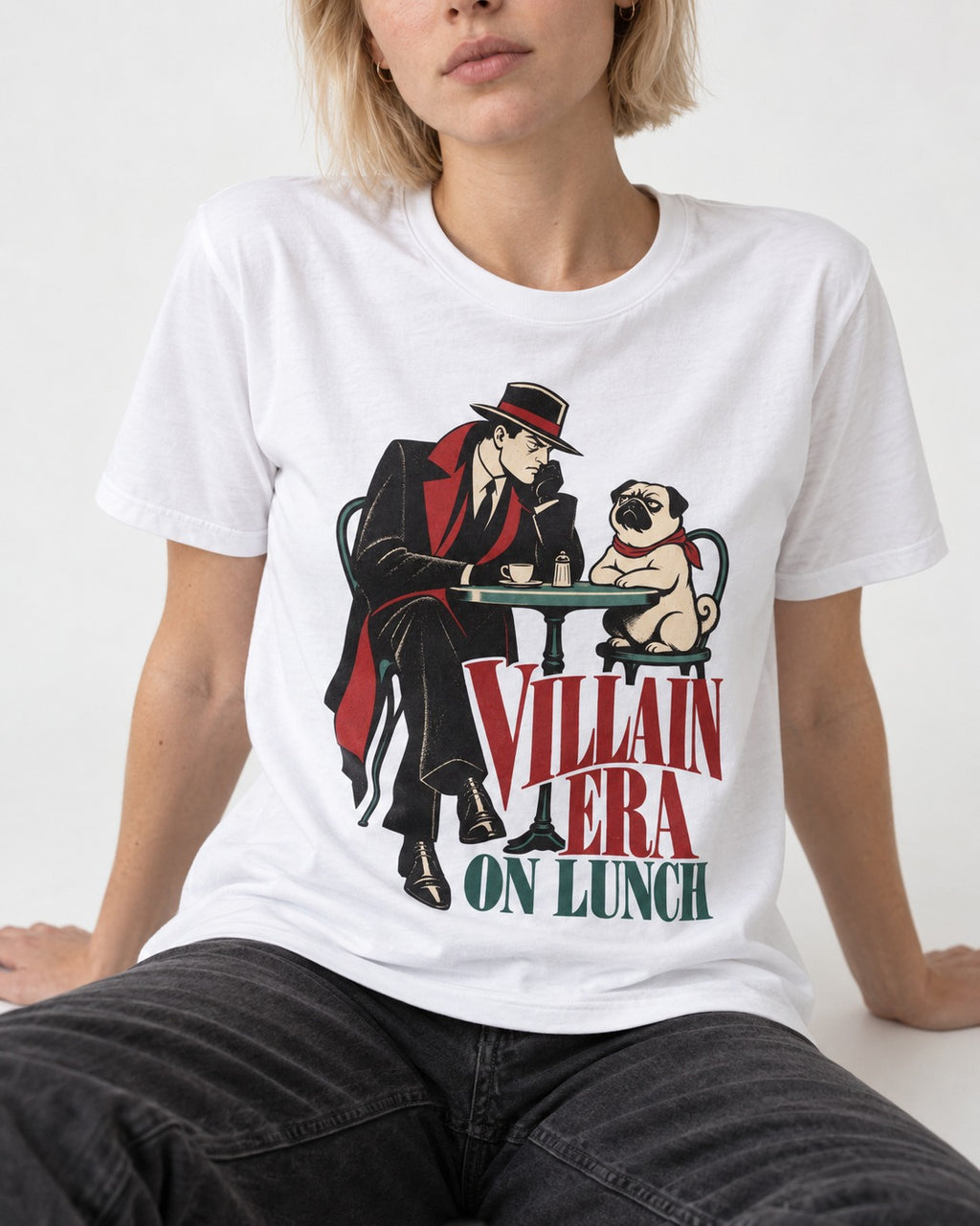 Pug Villain Era T-Shirt in White, worn by a seated model