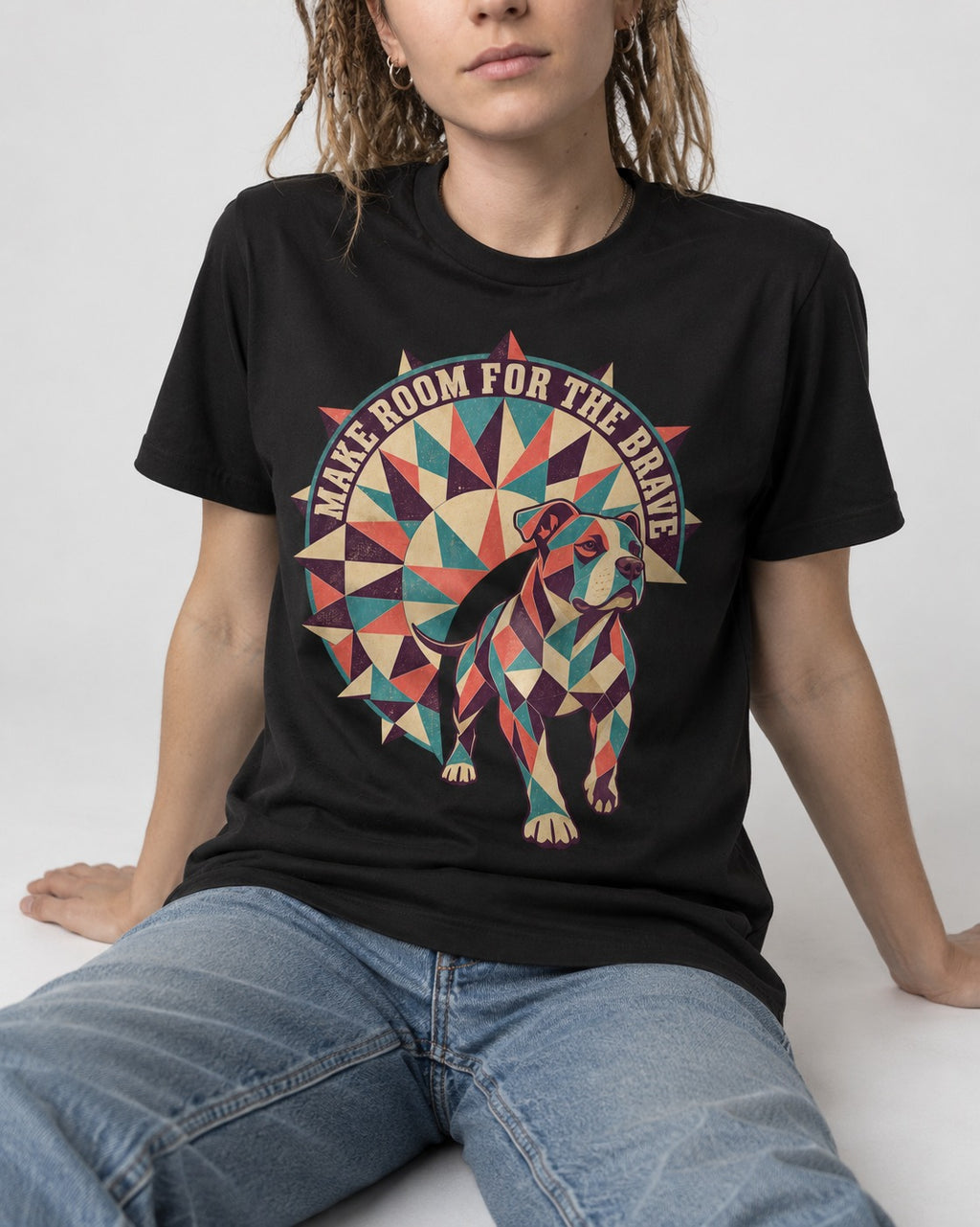 Pitbull Make Room for the Brave Mosaic Graphic T-Shirt in Black, worn by a seated model