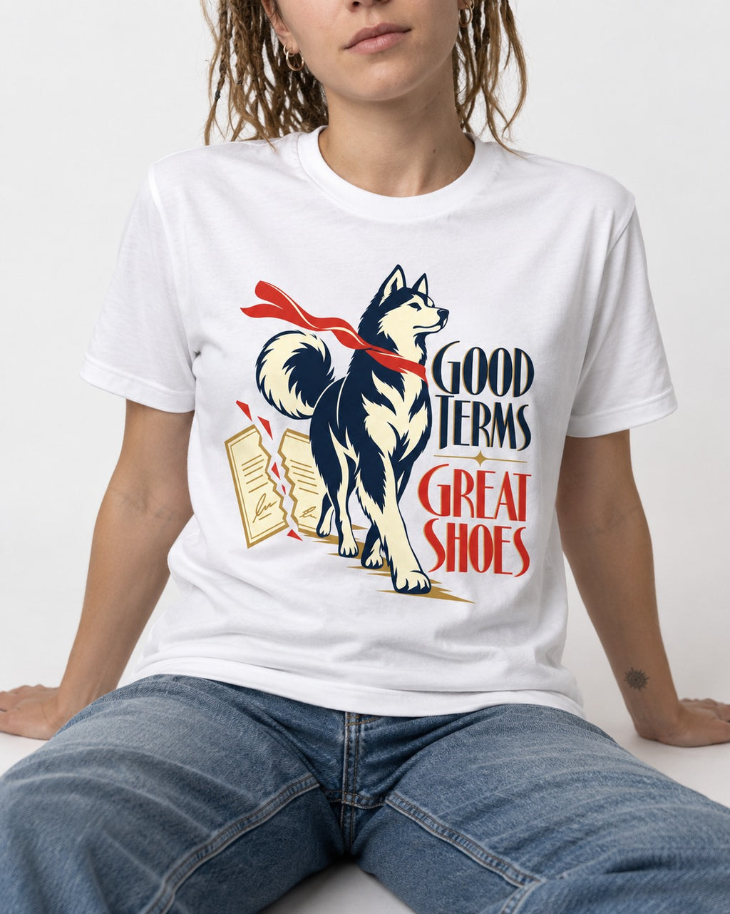 Husky Good Terms Great Shoes T-Shirt in White, worn by a seated model