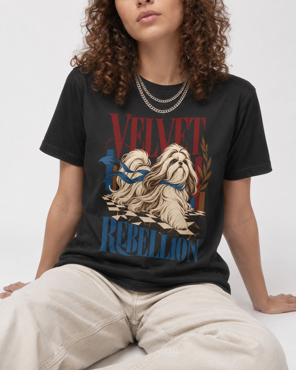 Shih Tzu Velvet Rebellion Checkerboard Graphic T-Shirt in Black, worn by a seated model