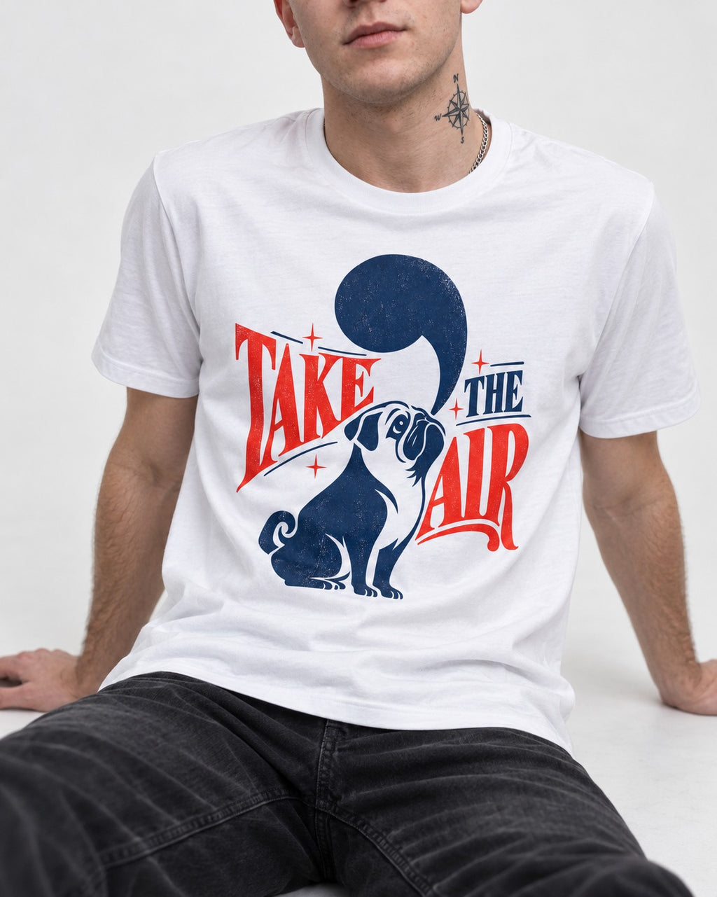 Pug Take the Air T-Shirt in White, worn by a seated model
