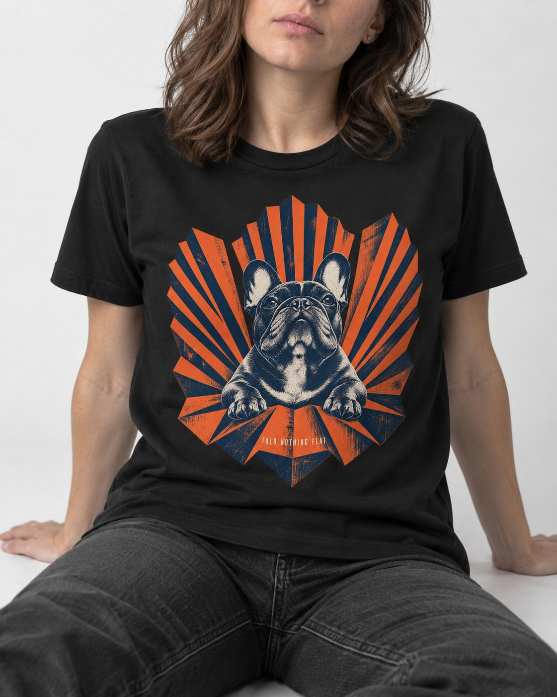 Frenchie Fold Nothing Flat Geometric Fan Graphic T-Shirt in Black, worn by a seated model