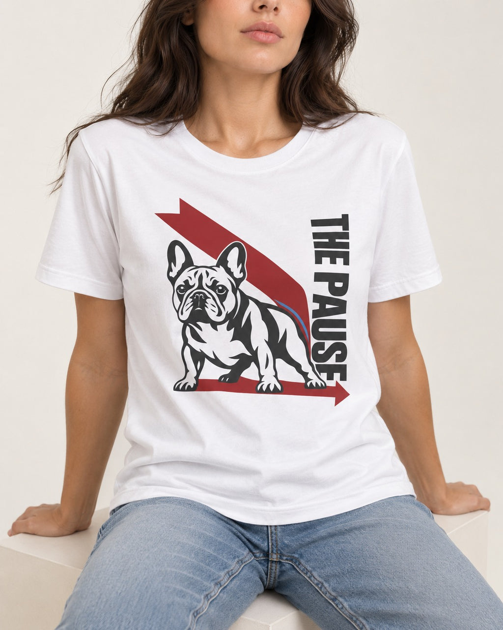 The Frenchie Pause T-Shirt in White, worn by a seated model