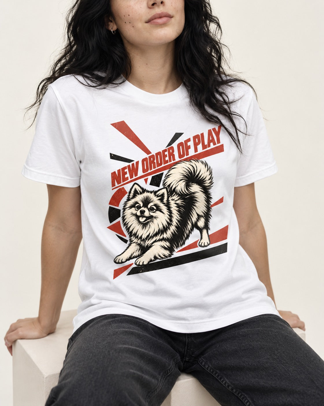 Pomeranian Order of Play T-Shirt in White, worn by a seated model