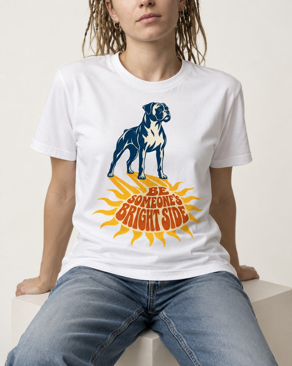 Boxer Be Someone's Bright Side T-Shirt in White, worn by a seated model