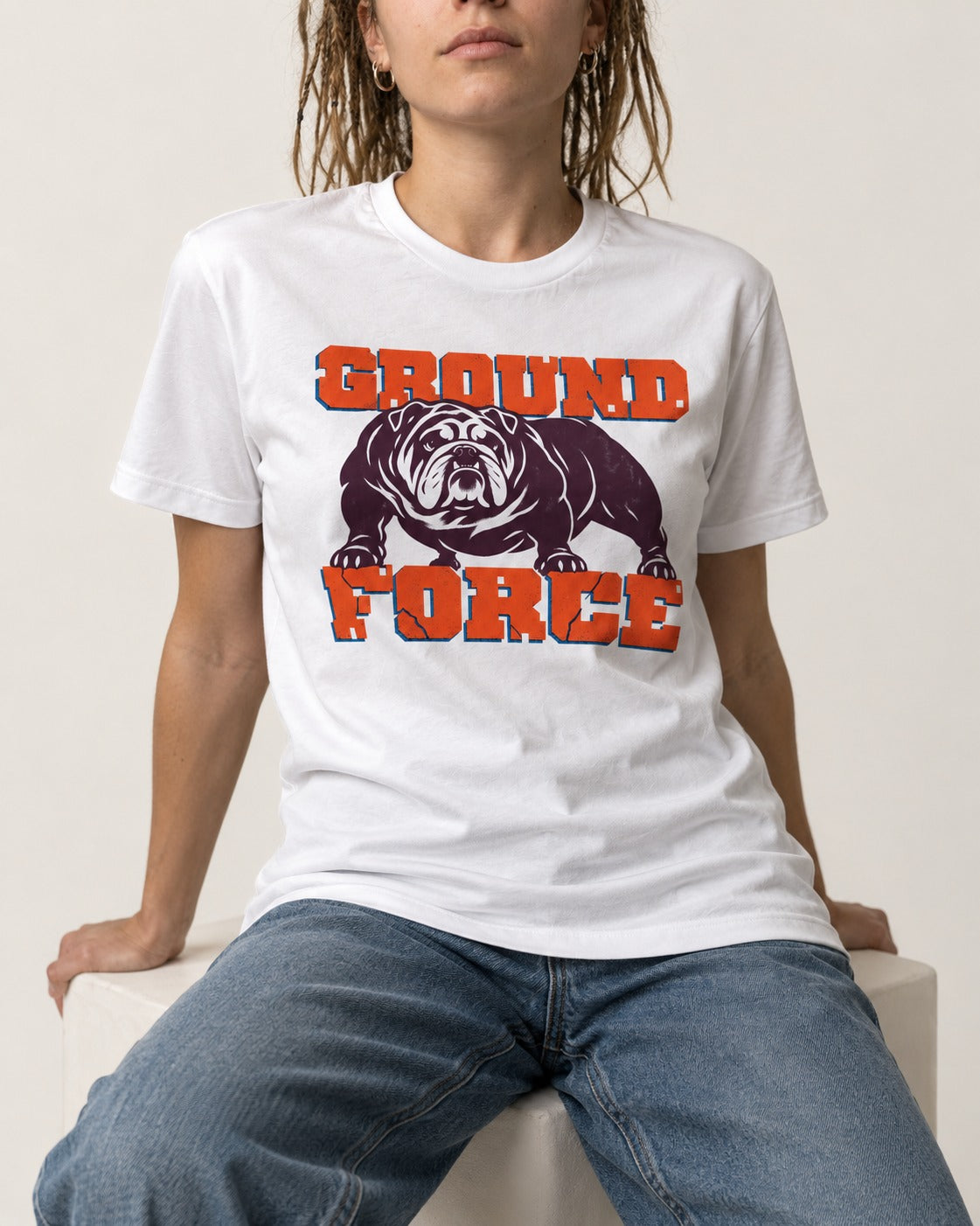 Ground Force English Bulldog T-Shirt in White, worn by a seated model