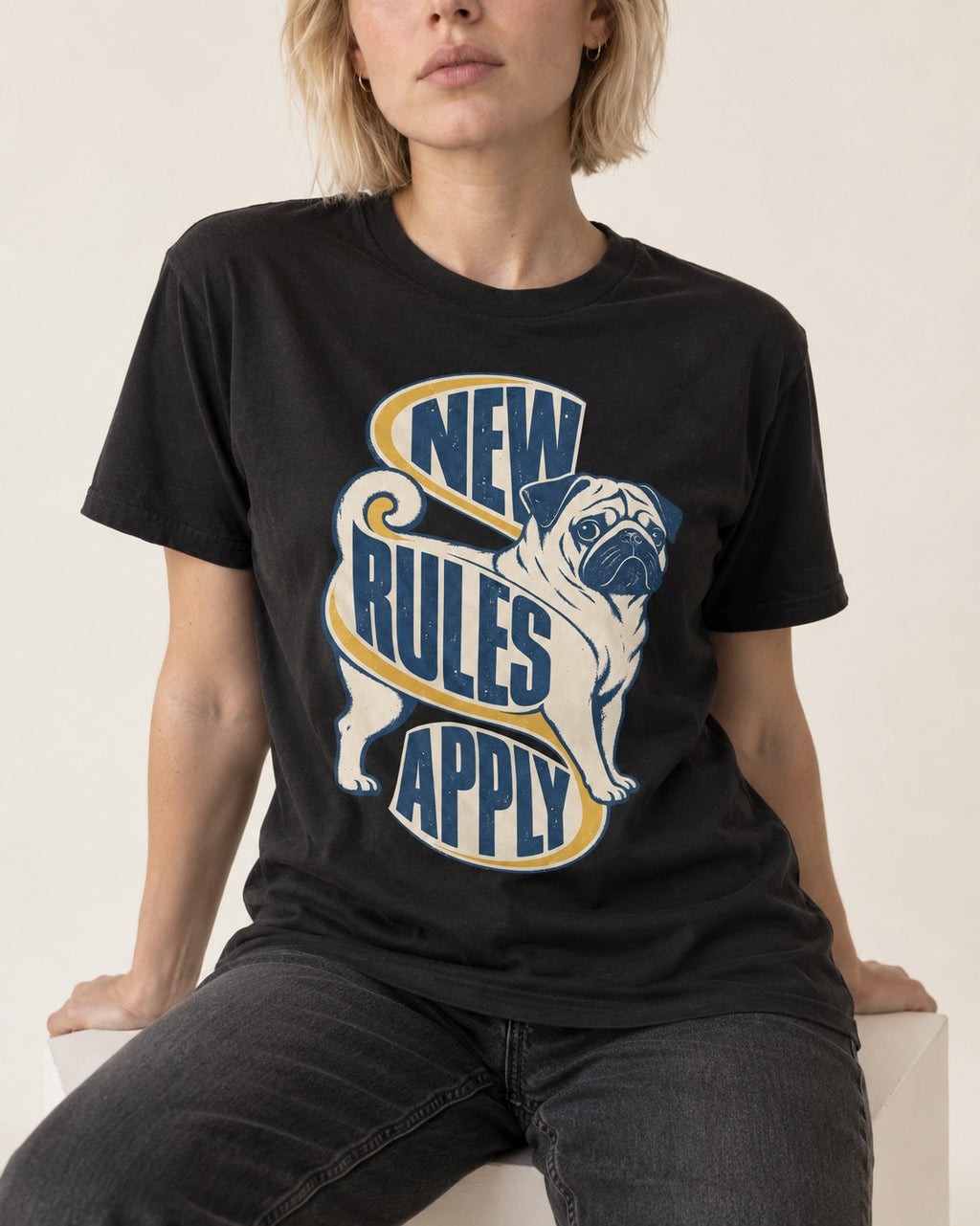 Pug New Rules Apply Ribbon Graphic T-Shirt in Black, worn by a seated model