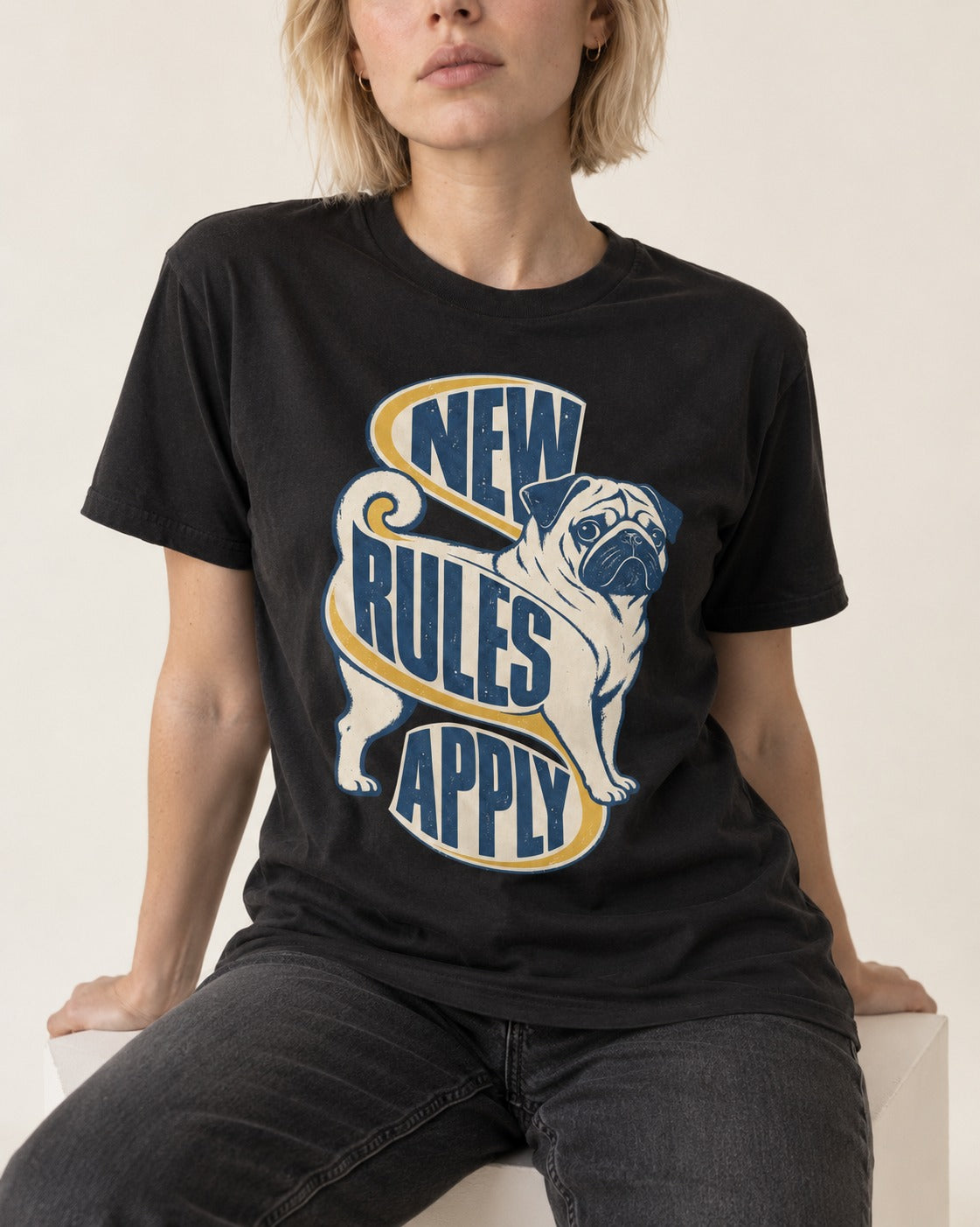 Pug New Rules Apply Ribbon Graphic T-Shirt in Black, worn by a seated model